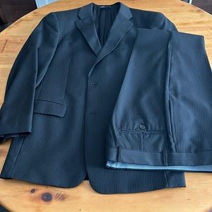 Tommy Hilfiger black pinstripe suit - coat 38R - 32 pant - very good condition.